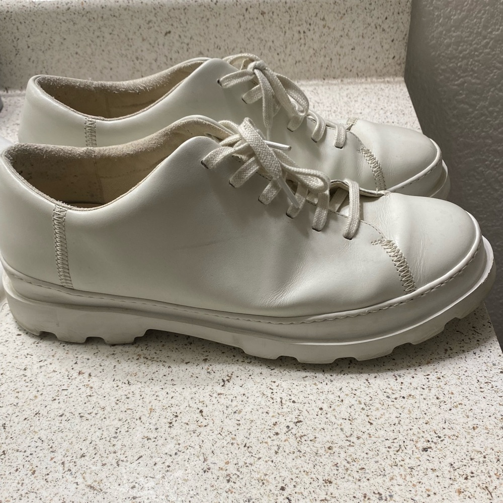 Camper brand shoes. Ivory color, retro style.